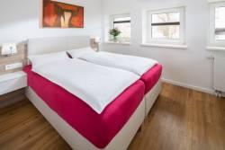 Schlafzimmer Luxus Ferienwohnung Leuchtturm Norderney