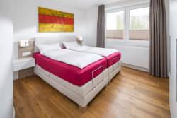 Luxus Ferienwohnung Norderney Schlafzimmer mit Boxspringbett