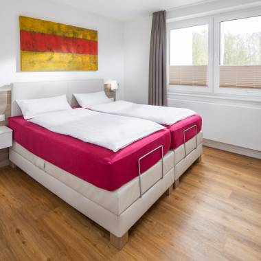 Luxus Ferienwohnung Norderney Schlafzimmer mit Boxspringbett